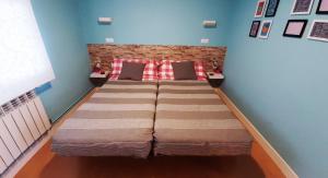 Posteľ alebo postele v izbe v ubytovaní Apartamento Talako
