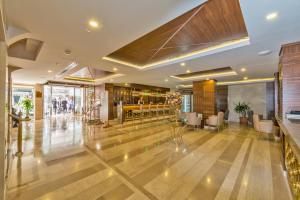 a lobby of a hotel with a bar at Bekdas Hotel Deluxe & Spa in Istanbul +124 photos
