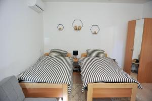 Postel nebo postele na pokoji v ubytování Studio apartman BandB