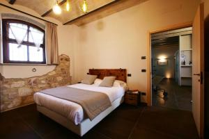 Borgo Degli Angeli Resort e Spa客房内的一张或多张床位