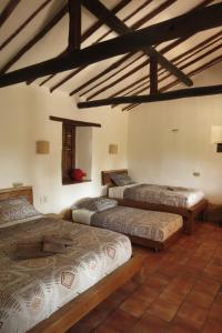Postel nebo postele na pokoji v ubytování Casa Alamanda B&B + 37 fotografií