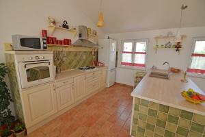 Kuchyňa alebo kuchynka v ubytovaní Sibenik Modern Apartment