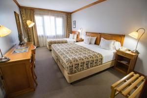 Cama ou camas em um quarto em Hotel Kosten Aike