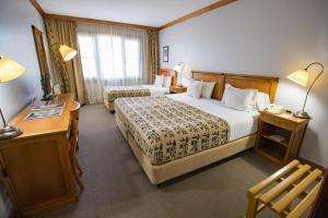 Una cama o camas en una habitación de Hotel Kosten Aike