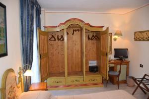 TV a/nebo společenská místnost v ubytování Park Hotel Mater Dei