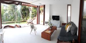 Area tempat duduk di Novissima Casa a 50mt do Mar na Praia Portodecima!