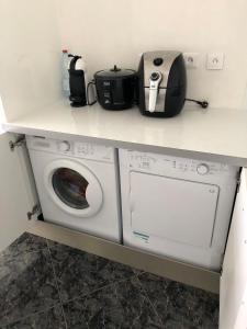 Kuchyň nebo kuchyňský kout v ubytování Cool Home