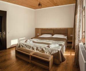 Letto o letti in una camera di Hotel panorama svaneti