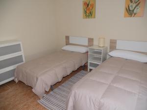 Postel nebo postele na pokoji v ubytování Apartamento Sanchiz