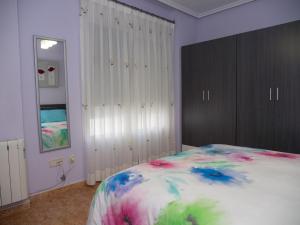 Postel nebo postele na pokoji v ubytování Apartamento Sanchiz