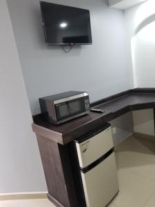 Kuchyň nebo kuchyňský kout v ubytování Sea Rock Hotel