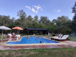 Swimmingpoolen hos eller tæt på Kau Chaink casa de campo