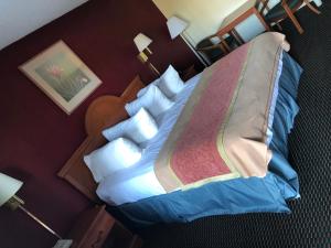Cama ou camas em um quarto em Travelodge by Wyndham Alachua