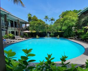 Swimmingpoolen hos eller tæt på Sanur Agung Suite