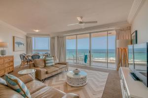 a living room with a view of the ocean at Carmel by the Sea in Gold Coast