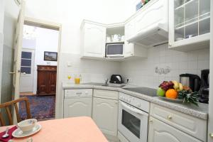 Kuchyňa alebo kuchynka v ubytovaní Mozart Apartments - Rögergasse