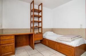 Postel nebo postele na pokoji v ubytování Villa Popillon 1
