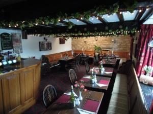 A restaurant or other place to eat at The Black Bull at Nateby