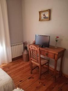 TV a/nebo společenská místnost v ubytování La Cerca
