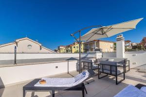 Balkón nebo terasa v ubytování Apartments Solis Lacus Penthouse