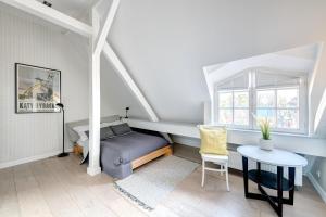 Postel nebo postele na pokoji v ubytování DR Apartments - Loft 2