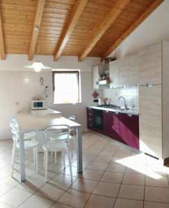 Kuchyň nebo kuchyňský kout v ubytování ECO - Villetta Arcobaleno