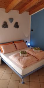 A bed or beds in a room at ECO - Villetta Arcobaleno