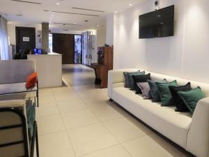 Televiisor ja/või meelelahutuskeskus majutusasutuses La Locanda Boutique Hotel
