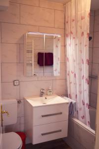 Ванна кімната в Hotel Garni Regina