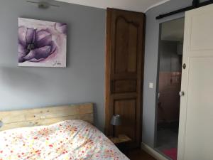 Postel nebo postele na pokoji v ubytování SUITE FAMILIALE DU BOURGEAU