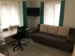 Predel za sedenje v nastanitvi Hotel Freihof