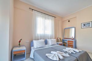 Postel nebo postele na pokoji v ubytování Villa Elia