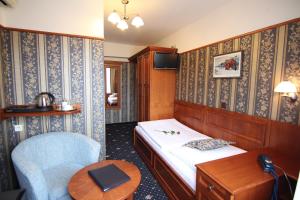 TV i/ili multimedijalni sistem u objektu Old Prague Hotel