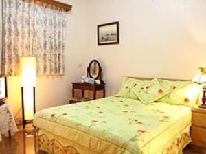 Cama o camas de una habitación en Yilan Affectivity