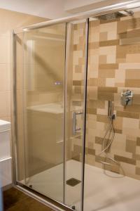 a shower with a glass door in a bathroom at LE TERRAZZE 6 in Puerto de la Cruz