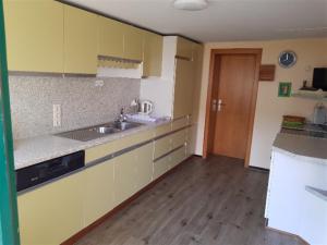a kitchen with a sink and a counter top at Ferien auf dem Bermeshof in Preischeid