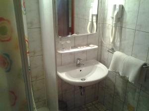 Koupelna v ubytování Guest House Arvaj + 37 fotografií