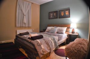 A bed or beds in a room at EskiZ - Our stone home
