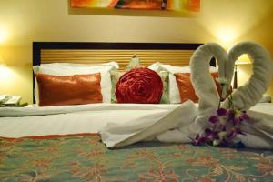 Postel nebo postele na pokoji v ubytování Dorus Hotel