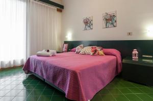 En eller flere senge i et værelse på Casa Vacanza Kair Bilo 218 + 18 billeder