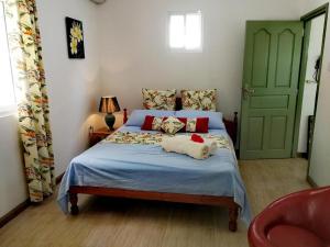 Ein Bett oder Betten in einem Zimmer der Unterkunft Cella Villa