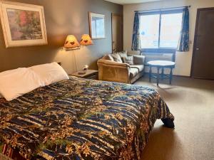 Postel nebo postele na pokoji v ubytování Hidden Lake Resort