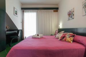 En eller flere senge i et værelse på Casa Vacanza Kair Bilo 224 + 19 billeder