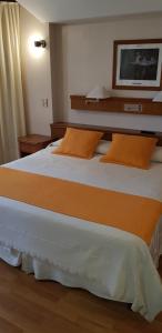 Postel nebo postele na pokoji v ubytování Primacy Apart Hotel