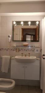Koupelna v ubytování Primacy Apart Hotel