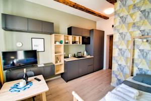 Kuchyňa alebo kuchynka v ubytovaní City Life Apartments Kraków