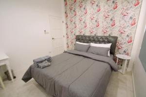 Postel nebo postele na pokoji v ubytování Little home poolvilla