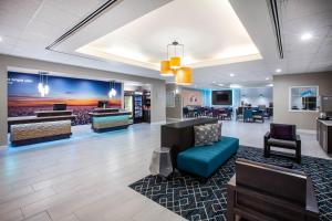 a lobby of a hospital with a waiting room at La Quinta by Wyndham Lubbock North in Lubbock