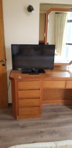TV a/nebo společenská místnost v ubytování Primacy Apart Hotel