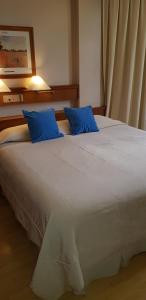 Postel nebo postele na pokoji v ubytování Primacy Apart Hotel